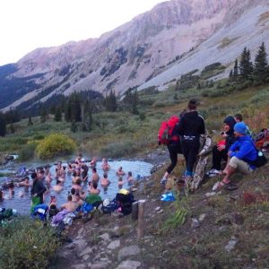 Over crowded natural spring in the mountains